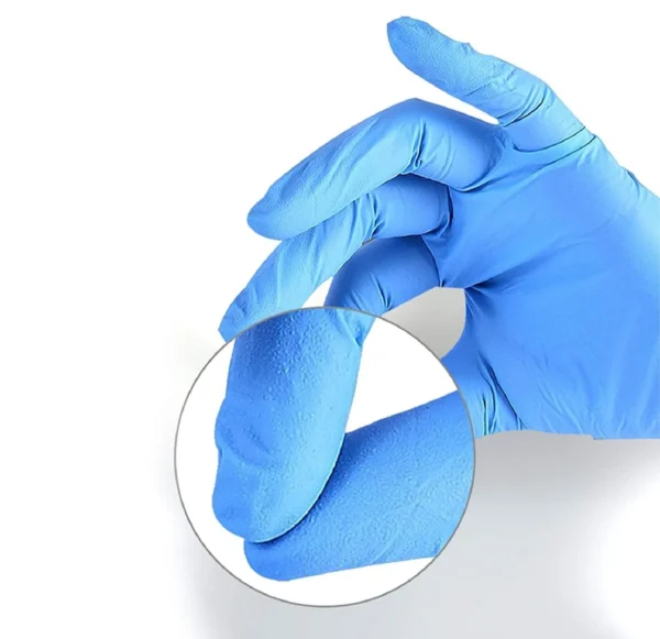 dexipro-nitrile-gloves-textured-fingertip Close up of textured fingertips on Dexipro blue nitrile glove for non slip grip